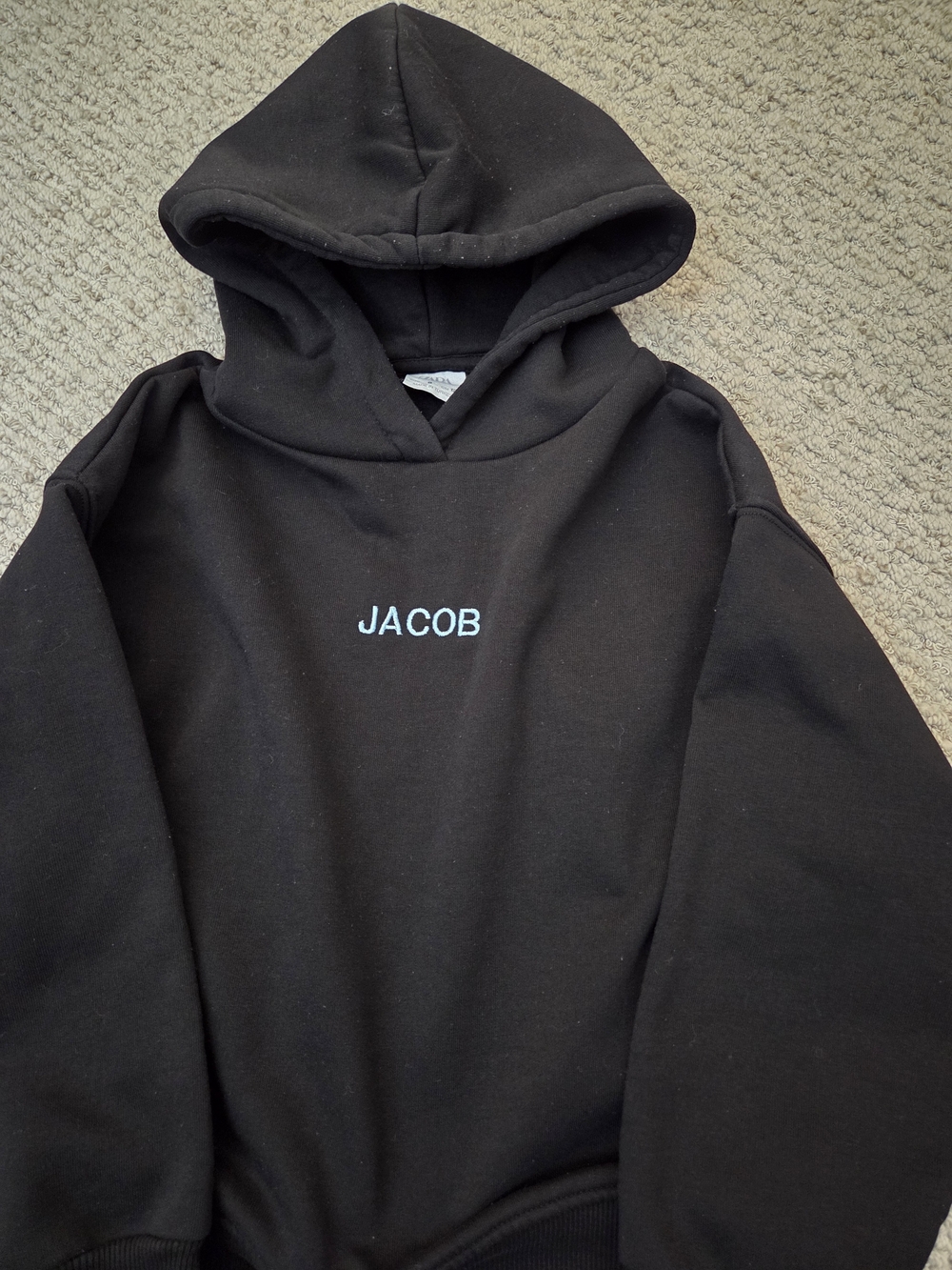 Black Hoodie with 'JACOB' Embroidered Chest - Kids Sweater (ZARA) Size 8